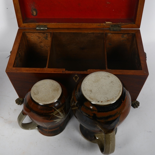 470 - 19th century sarcophagus tea caddy on brass paw feet, 29cm, and a graduated set of 3 glazed Studio p... 