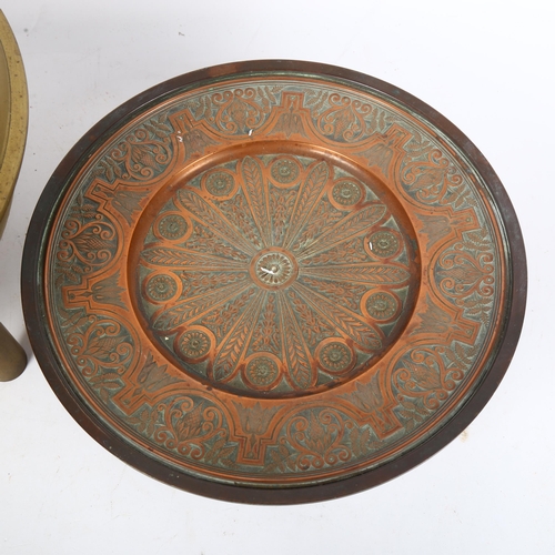 497 - A brass cauldron and an embossed copper tazza, 26.5cm across