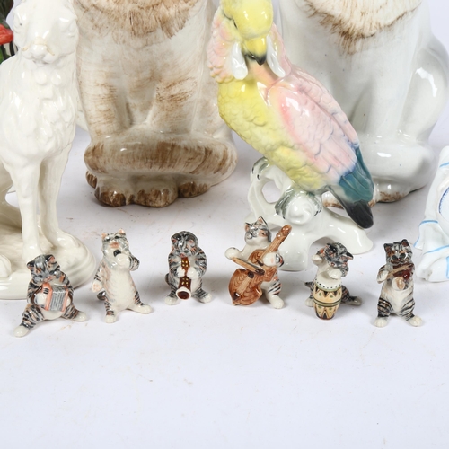 501 - A pair of cats, 26.5cm, a hare, cockatoo, miniature cat band etc