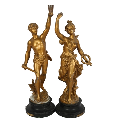 509 - A pair of French gilded spelter figures, Victoire & Glorie after Bruehon, tallest 52cm