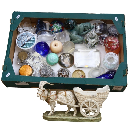 525 - A group of paperweights, figure, goat cart etc