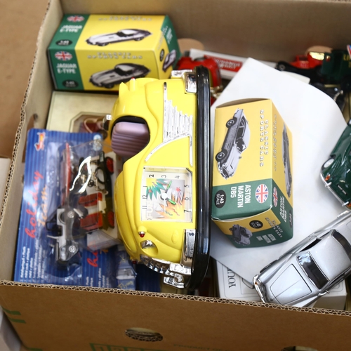 533 - WITHDRAWN - A dodgem car clock, boxed Days Gone and other toy vehicles