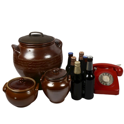 571 - 1960s red dial telephone, stoneware storage jars, and souvenir ales