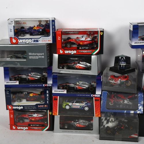 628 - A quantity of Corgi, Burago, Atlas Editions etc diecast vehicles, all boxed and motor racing related... 