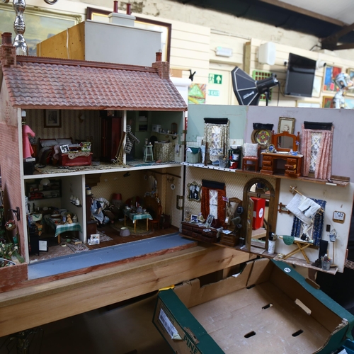 633 - A 1940s style doll's house and garden, 2 floors with fitted interior, and associated garden scene in... 