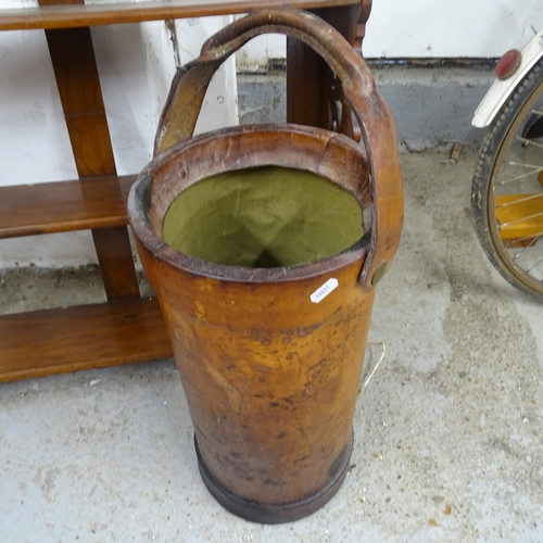 2692 - An Antique mahogany hanging shelf, 78 x 94 x 20cm, and a leather bucket, H68cm