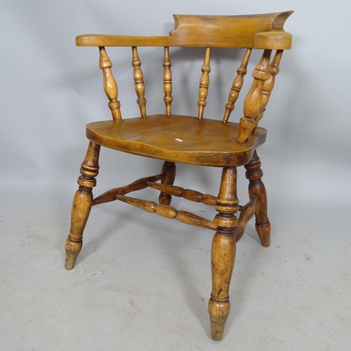 2699 - An elm-seated smoker's bow-arm chair