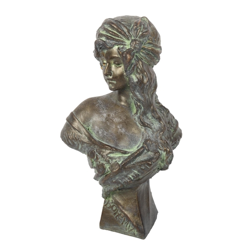 650 - A verdigris terracotta bust of a gypsy girl, title 