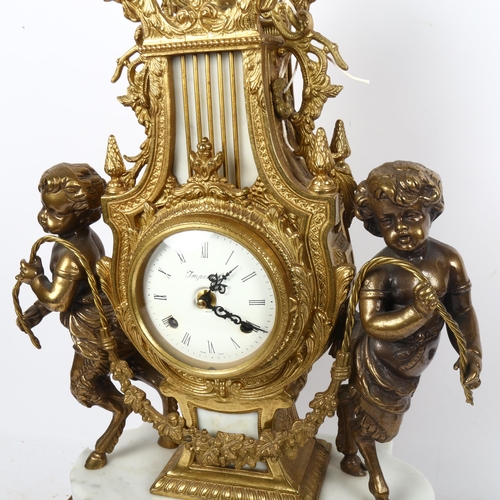 654 - FRANZ HERMLE - an ornate mantel clock with gilt-metal decoration, 8-day movement, height 60cm