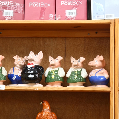 684 - A set of 12 Wade NatWest piggy banks