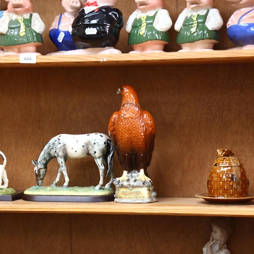 685 - A group of 4 Royal Doulton animal figures, on separate plinths, including a Barn owl, 2 Pointers, an... 