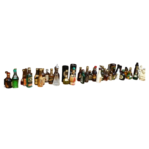 688 - A large quantity of alcoholic miniatures, including Martini, Brandy, Baileys, Malibu etc, including ... 