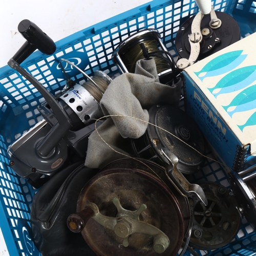 709 - A quantity of Vintage fishing reels, including Penn reels, Penn long beach metal spool stardrag 65, ... 