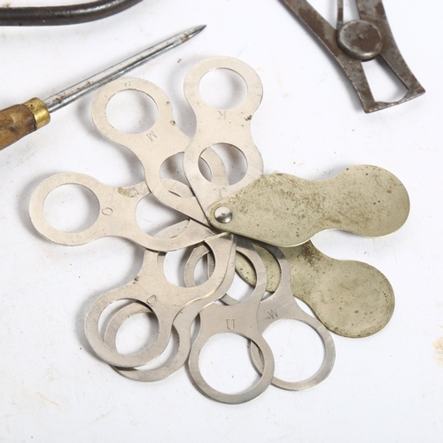 752 - A quantity of jeweller's tools, and a ring sizing set