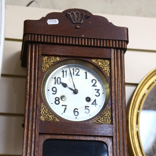 773 - A Vintage stained oak 8-day drop-dial wall clock, case height 55cm, with pendulum