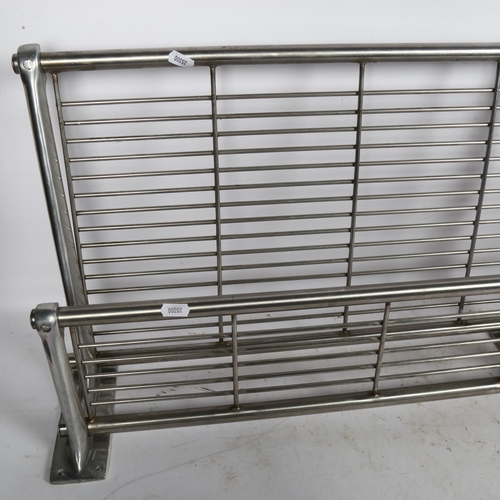 792 - A polished steel Vintage luggage rack from a train, with wall fittings, length 117cm