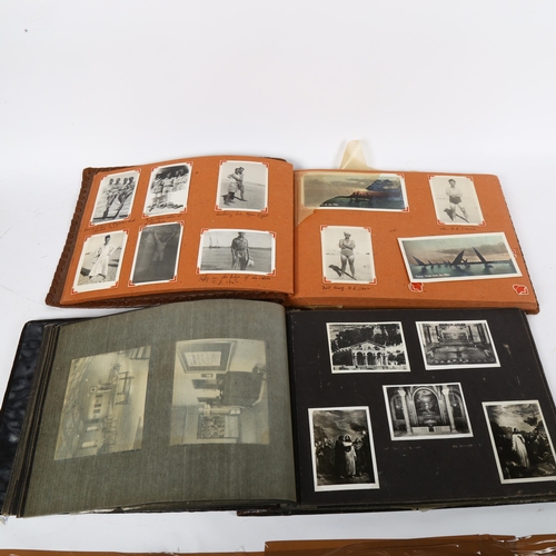 859 - A photo album containing military photographs relating to WW2 and troops stationed in Egypt  and a s... 