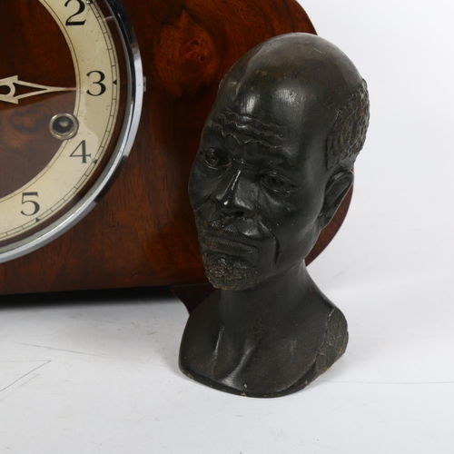 867 - A 1920s walnut-cased 8-day mantel clock, by The Enfield Clock Company, and 2 soapstone busts