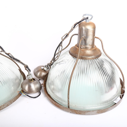 869 - A pair of industrial pendant light fittings, with ribbed glass shades, D 41cm