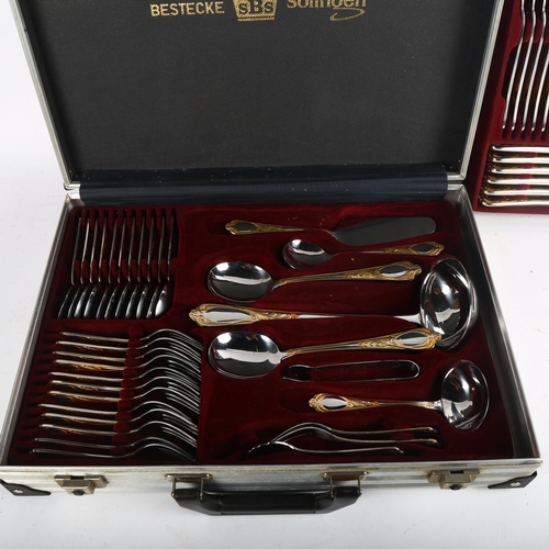 1013 - BESTECKE SOLINGEN - a 70-piece gold plated canteen of cutlery in fitted case