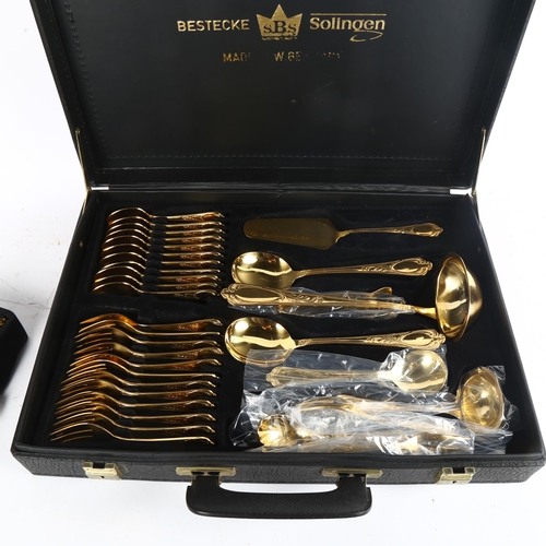 1015 - BESTECKE SOLINGEN - a 69-piece canteen of gold plated cutlery, in fitted case