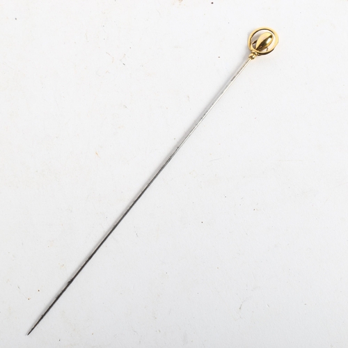 1089 - CHARLES HORNER - an Art Nouveau 9ct gold hat pin, with stylised finial, hallmarks for Chester 1909