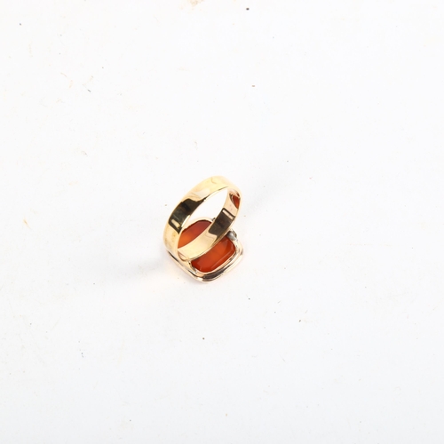 1090 - An Antique gold and cornelian set seal ring, engraved with female figure with an anchor