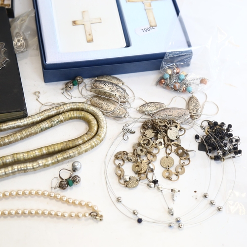 1025 - Various costume jewellery, wristwatch, a silver crucifix and silver-mounted New Testament, boxed etc