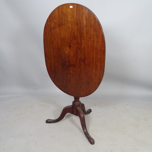 2702 - A 19th century mahogany oval tilt-top occasional table, 83 x 74cm x 62cm