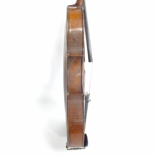 279 - A Vintage violin, cased and bow present, no maker's label in violin, violin length 34cm