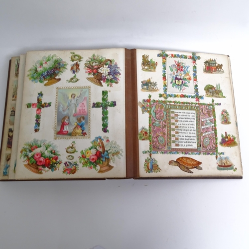 165 - A Victorian greeting card and scrap album, bound in leather and carved French walnut, by Wirth Broth... 