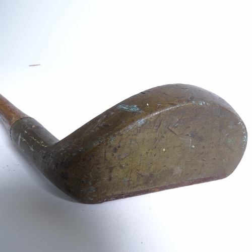 644 - A quantity of Vintage golf clubs and walking sticks, including thumb stick with various commemorativ... 