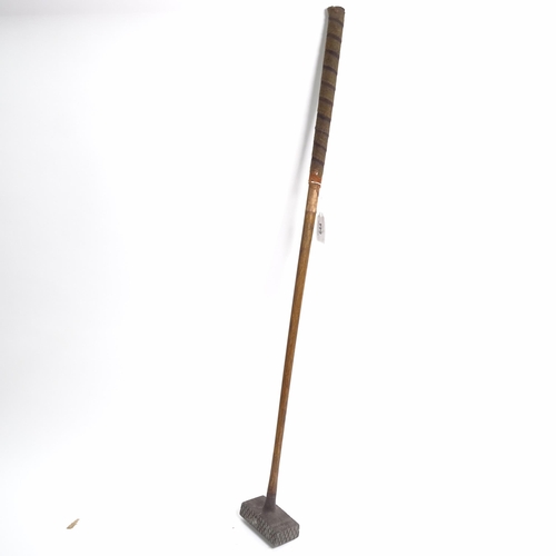 644 - A quantity of Vintage golf clubs and walking sticks, including thumb stick with various commemorativ... 