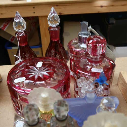 514 - Cranberry overlay scent flasks, decanter etc, and Art Deco atomiser scent bottle, 12cm etc