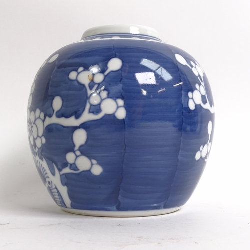 209 - 3 Chinese blue and white ginger jar and covers, all prunus decorated, on stands, 1 lacking its lid, ... 