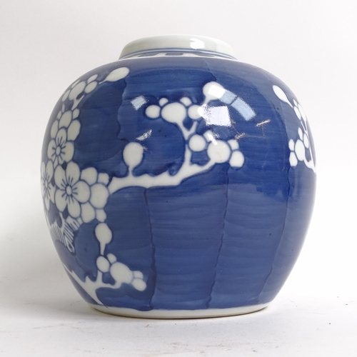 209 - 3 Chinese blue and white ginger jar and covers, all prunus decorated, on stands, 1 lacking its lid, ... 