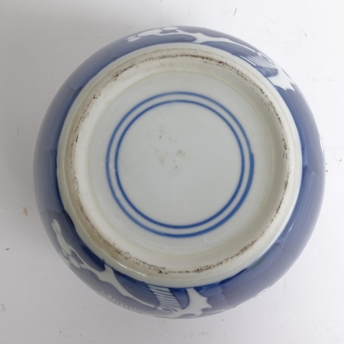 209 - 3 Chinese blue and white ginger jar and covers, all prunus decorated, on stands, 1 lacking its lid, ... 