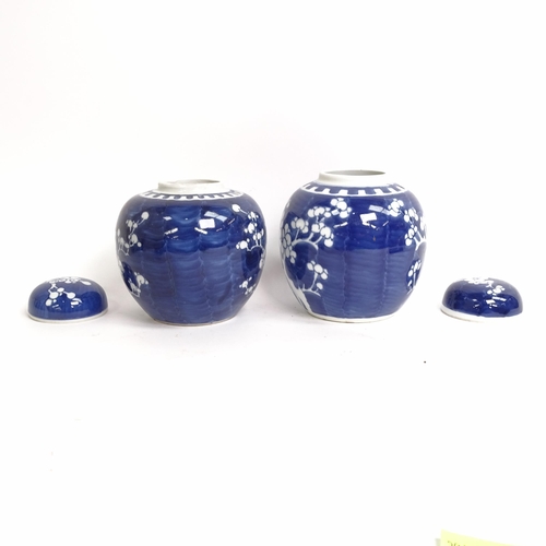 209 - 3 Chinese blue and white ginger jar and covers, all prunus decorated, on stands, 1 lacking its lid, ... 