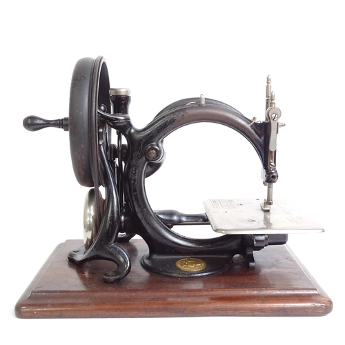 265 - Willcox & Gibbs Antique sewing machine - dated 1883, serial no. A362673 - with original box and inst... 