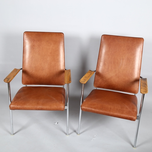 48 - A pair of 1960s' American Pace chairs by Simmons, with oak armrest on tubular steel, brown leather u... 