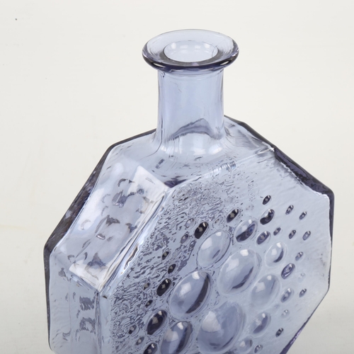 24 - NANNY STILL for Riihimaen Lasi Oy, Finland, a 1960s' moulded Stella Polaris design bottle, height 19... 