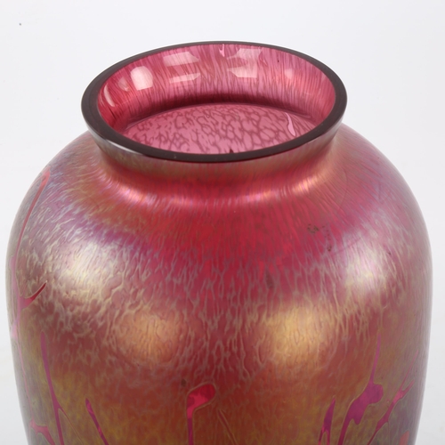 43 - Royal Brierley studio, an iridescent cranberry glass vase, signed to base, height 23.5cm