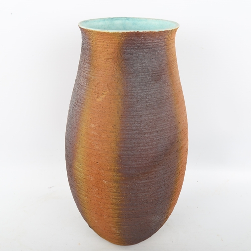 176 - A large studio pottery baluster vase, glazed interior, makers marks to base, height 36cm