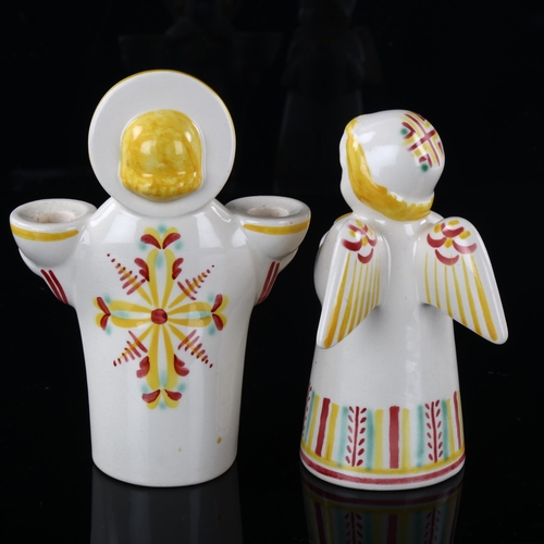 57 - A pair of Royal Copenhagen Christmas Angel candle holders, makers marks to base, tallest 13cm