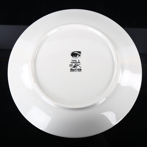 64 - A FORNASETTI plate, model 201, makers stamp to back, diameter 26.5cm