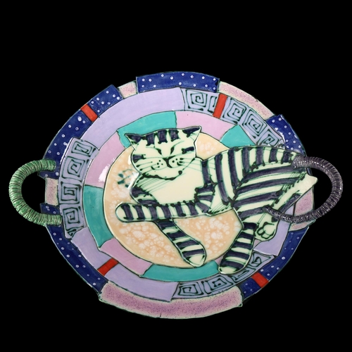 67 - JOUZAS & ROSA SALDAITAS, a large studio pottery cat design bowl made 1998, signed to base, handle to... 