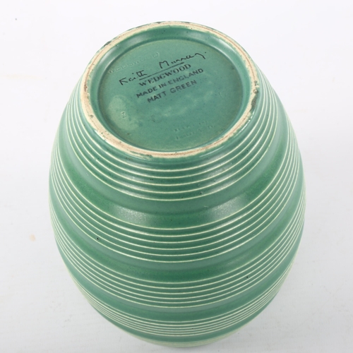 86 - KEITH MURRAY for Wedgwood, a 1930s' ribbed vase in Matt Green, makers marks to base, height 17.5cm