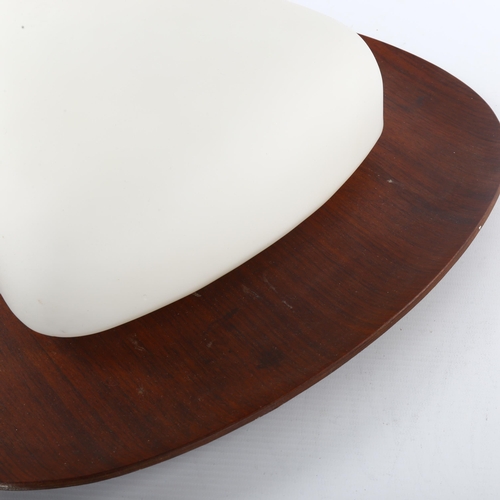 91 - GOFFREDO REGGIANI, a 1960s' design wall light, frosted glass on teak ply back board, diameter 40cm