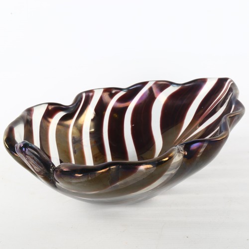 143 - TYRA LUNDGREN for Venini, a 1930s' thick glass leaf bowl, with amethyst detail and slight iridised s... 