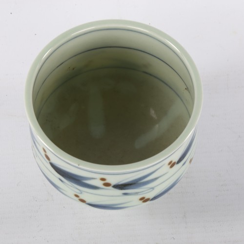 162 - DEREK CLARKSON, a studio pottery porcelain tea bowl, with celadon, cobalt and iron glaze, maker stam... 